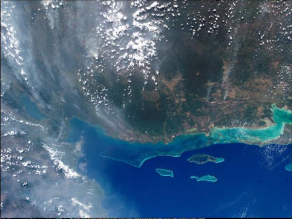 Satellite Image, Photo of Smokey Sky over Belize and Guatemala
